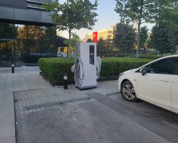 In the bustling outdoor parking lot of a Korean office building, the Pilot x Piwin DC EV Charging Station offers a seamless integration of efficiency and accessibility